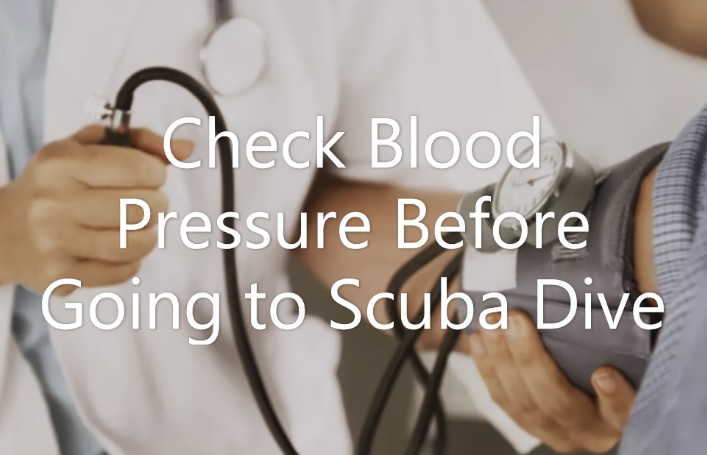 checking blood pressure before going to scuba dive